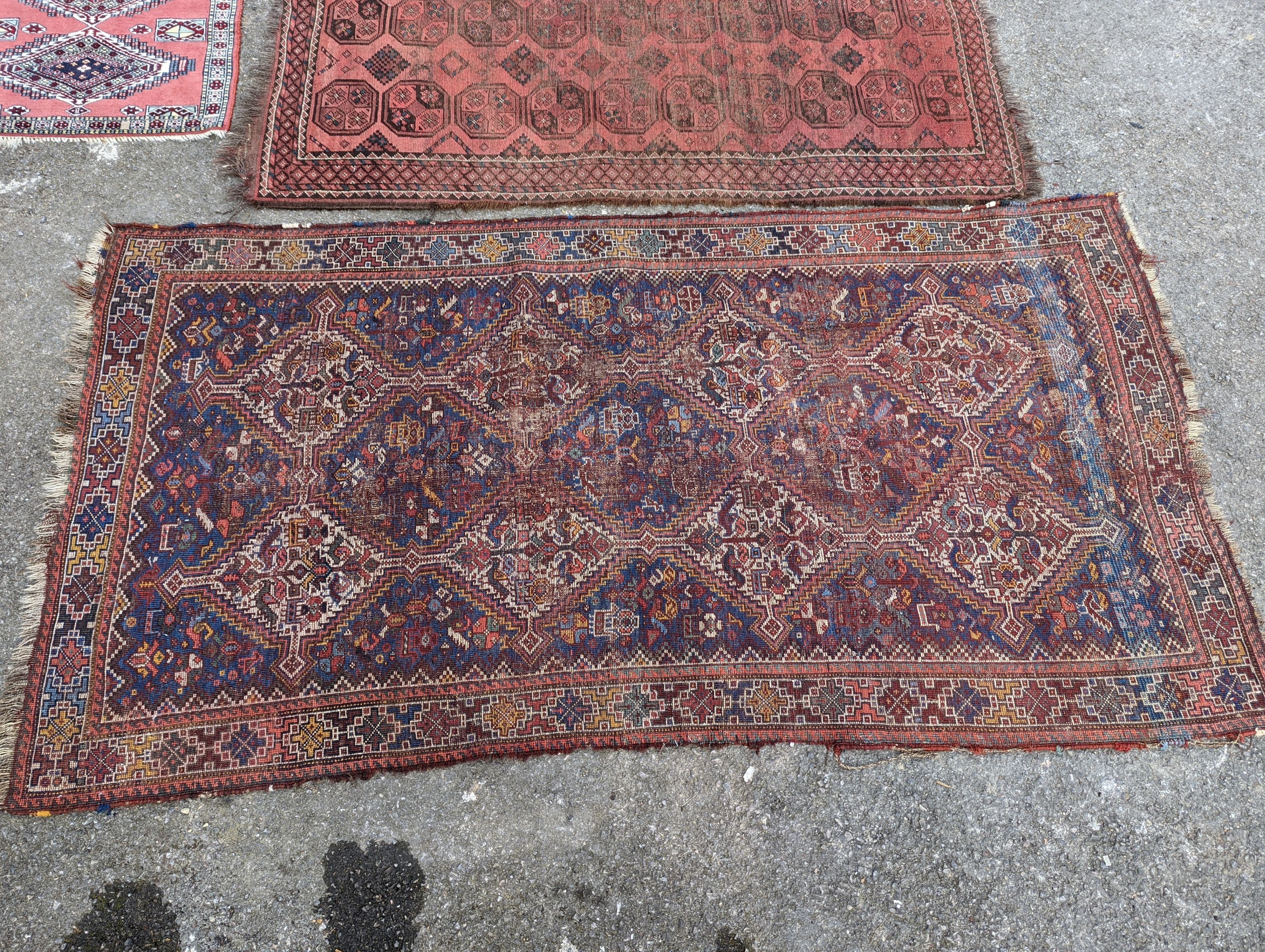 A North West Persian blue ground runner, 300 x 109 (worn and holed) a North West Persian rug, Bohara rug and mat